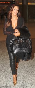 kim-kardashian-faux-leather-pants-and-crocodile-skin-bag