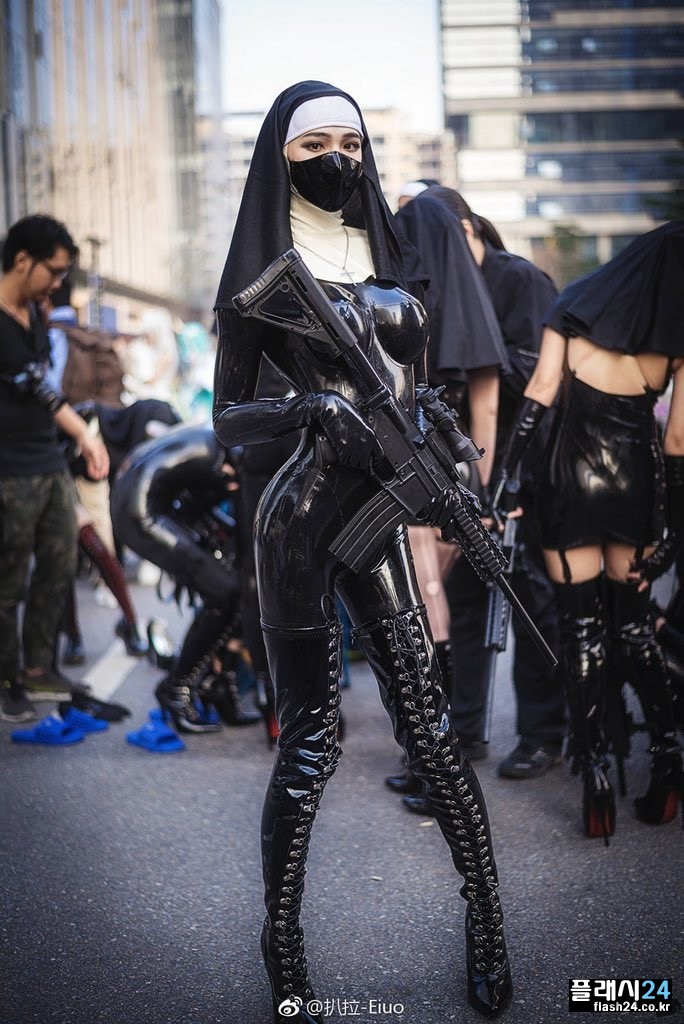 Black latex Saint costume