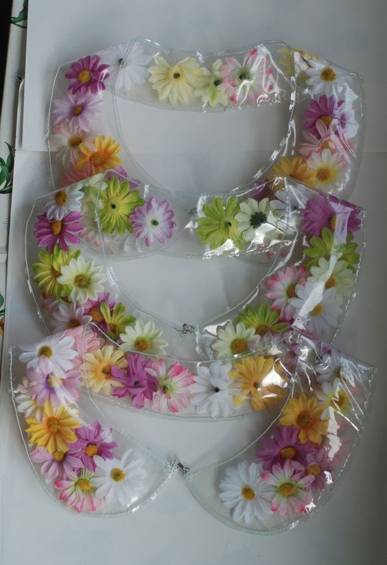 Clear plastic collar with flowers