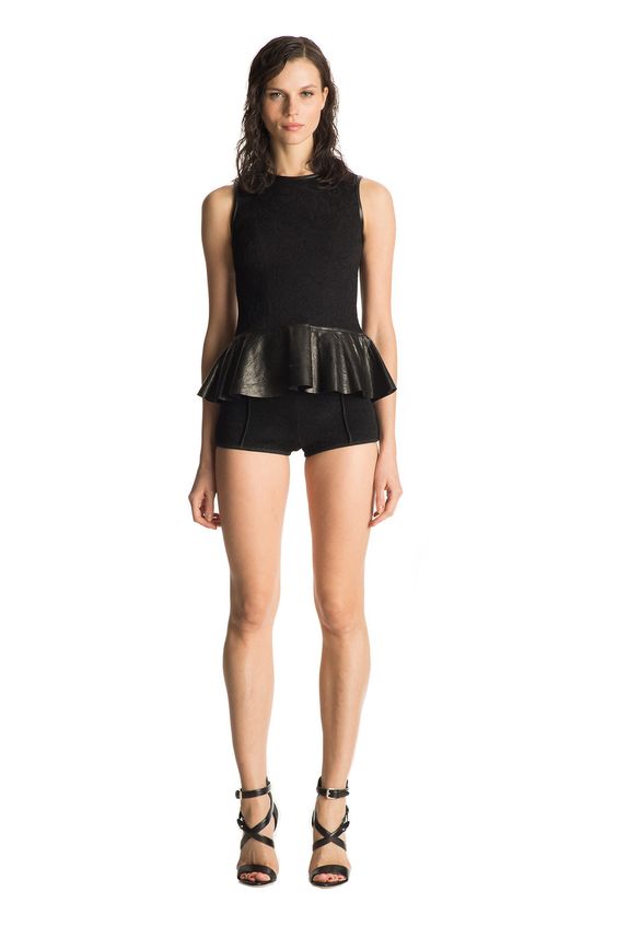 Sleeveless top with faux leather peplum