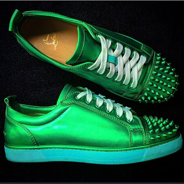 Green sneakers with spikes