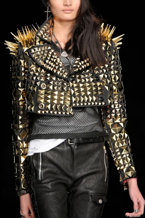 Black jacket with large gold spikes and studs