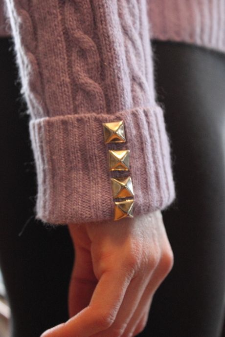 Sweater with studded cuffs