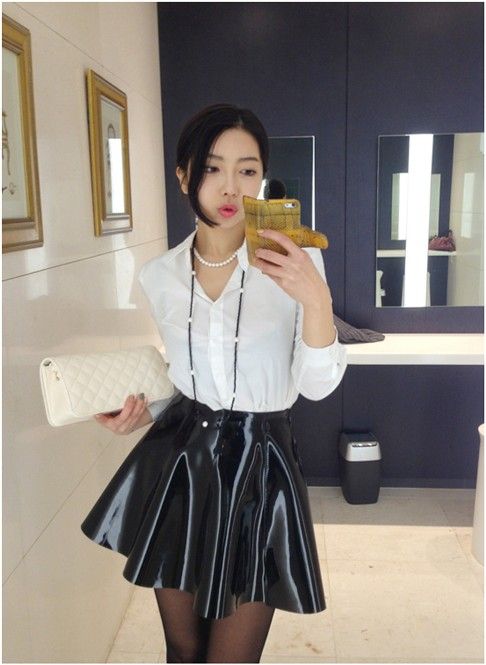 Shiny black flare skirt selfie