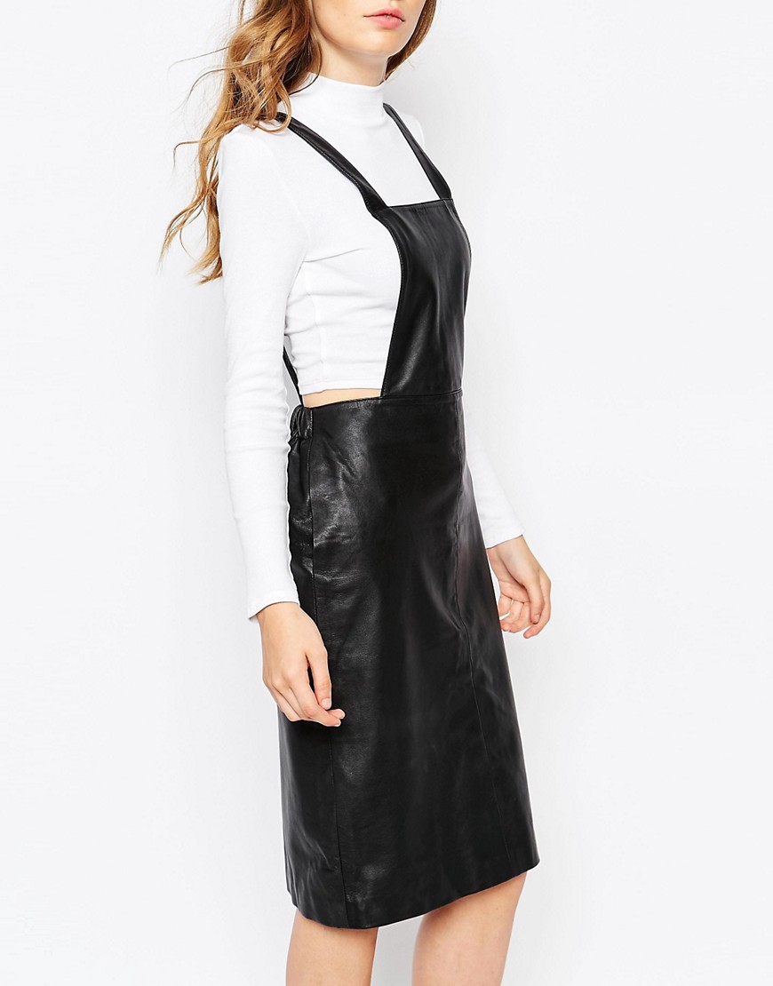 Side view of leather overall dress