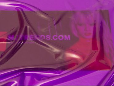 Transparent purple latex rubber with shine.