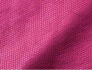 Metallic pink faux snakeskin fabric.