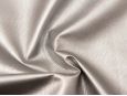 Light reflecting off metallic silver snakeskin embossed vinyl fabric. thumbnail image.