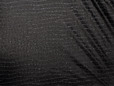 Black stretch crocdile reptile print faux snakeskin embossed vinyl fabric. thumbnail image.