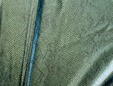 Shiny vinyl snakeskin stretch fabric in green color. thumbnail image.