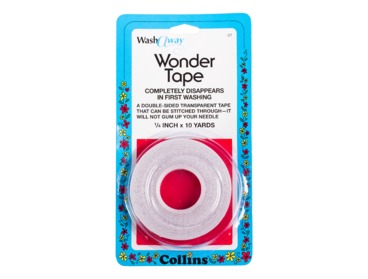 Collins double sided wonder tape.  Dissolves when washed.