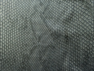 Green and black veggie snakeskin viny fabric with 4-way stretch.l