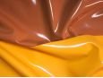 Rust versus orange color stretch vinyl fabric. thumbnail image.