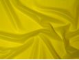 Semi-transparent yellow latex rubber sheeting material. thumbnail image.