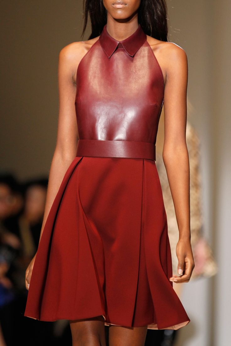 Image of: Red leather collared top.