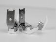 Teflon presser foot for sewing sticky fabrics. thumbnail image.