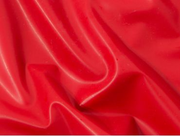 Red latex rubber shiny fabric.