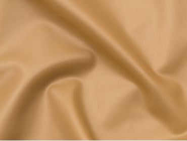 Metallic gold latex rubber material.