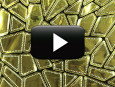 Video showcasing our sewn-on gold vinyl sequin fabric that looks like shattered mirror material.