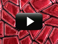 Video showcasing our sewn-on red vinyl sequin fabric that looks like shattered mirror material.