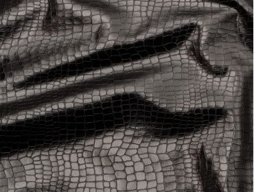 4-way stretch black snakeskin fabric.