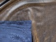Backing of bronze imitation snakeskin fabric. thumbnail image.