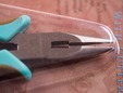 Closeup of chain maille pliers nose. thumbnail image.