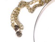 Heart shaped chain clasp on gold metal belt. thumbnail image.