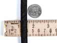 Size of black encased quarter inch polyester boning. thumbnail image.