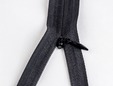 Macro shot of 22 inch black invisible zipper. thumbnail image.