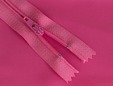 Hot pink 7 inch zipper shown with matching fabric. thumbnail image.