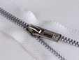 White 7 inch non-separating zipper with silver teeth. thumbnail image.