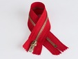 Red 9 inch zipper with brass teeth. thumbnail image.