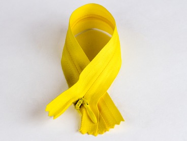 Yellow hidden concealed zipper.