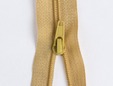 Gold zipper upclose. thumbnail image.