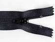 Upclose shot of black nylon non-separating zipper. thumbnail image.