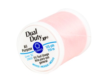 Baby pink 100% polyester general thread for sewing.