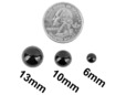 Different sizes of black dome spikes. thumbnail image.