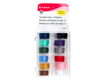 Pre-would bobbins in a variety of colors.