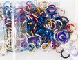 Pack of small multi-colored jump rings. thumbnail image.