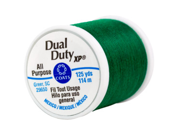 Kelly green all purpose polyester thread.