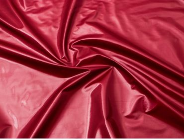 Metallic red stretch vinyl fabric.