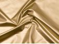 Metallic gold 4-way stretch vinyl fabric. thumbnail image.