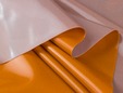 Double sided metallic orange and grey latex sheeting. thumbnail image.