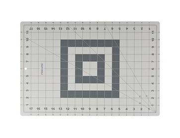 Fiskar 18x12 rotary cutting mat with grid.