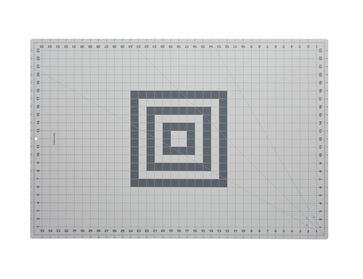 Fiskar 36x24 rotary cutting mat with grid.