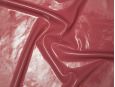 Dusty rose red latex sheeting with shine applied. thumbnail image.