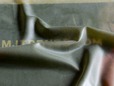 Military green semi-transparent latex rubber for clothing thumbnail image.