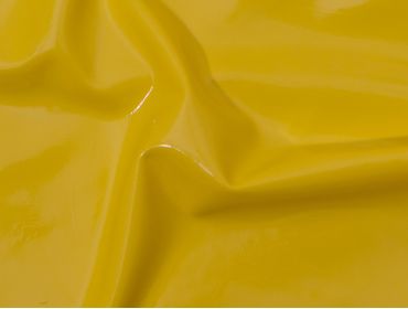 Yellow latex sheeting.  Can be shined to a high gloss with latex shine.